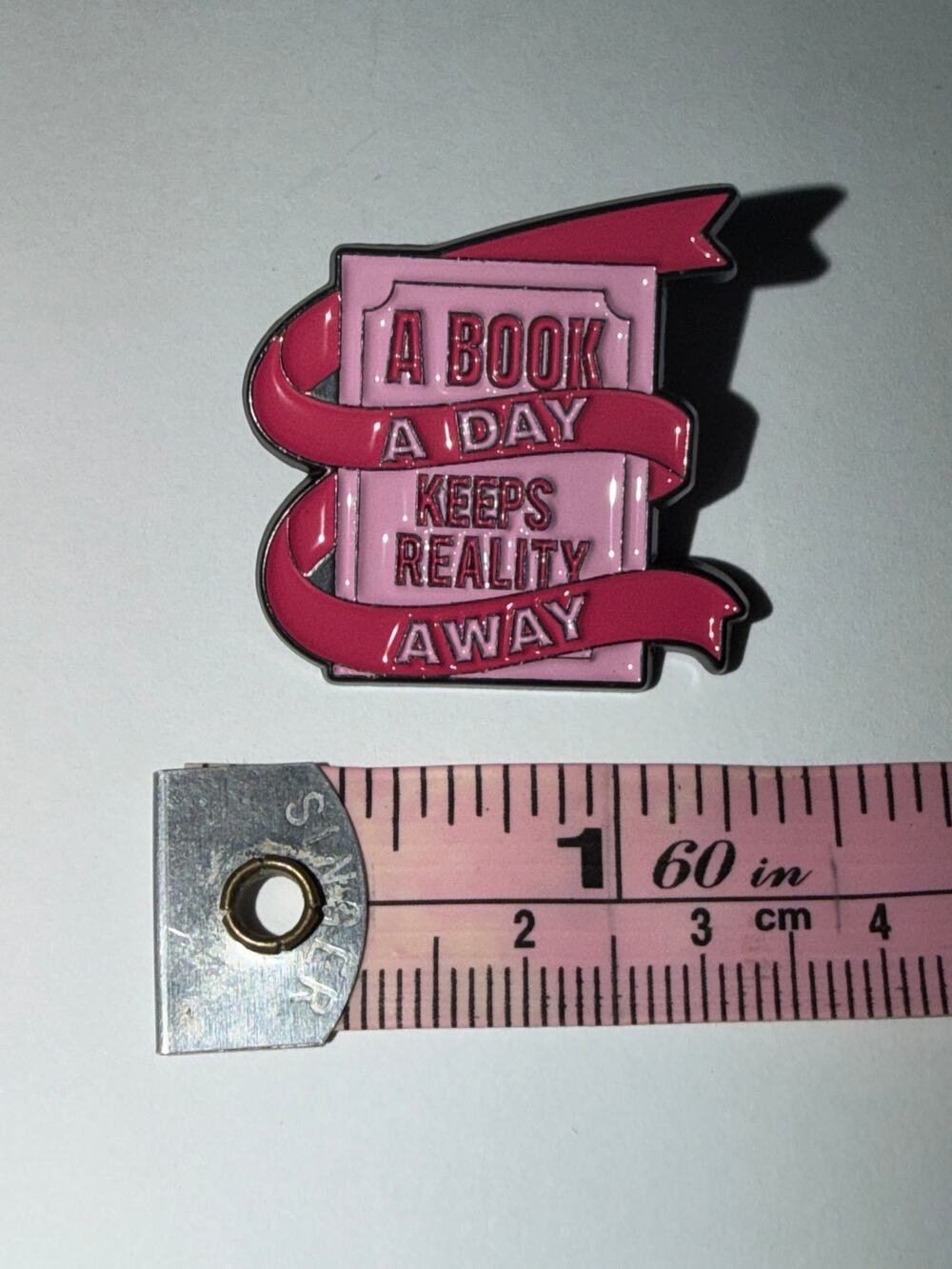 A Book a Day Keeps Reality Away Pin Brooch